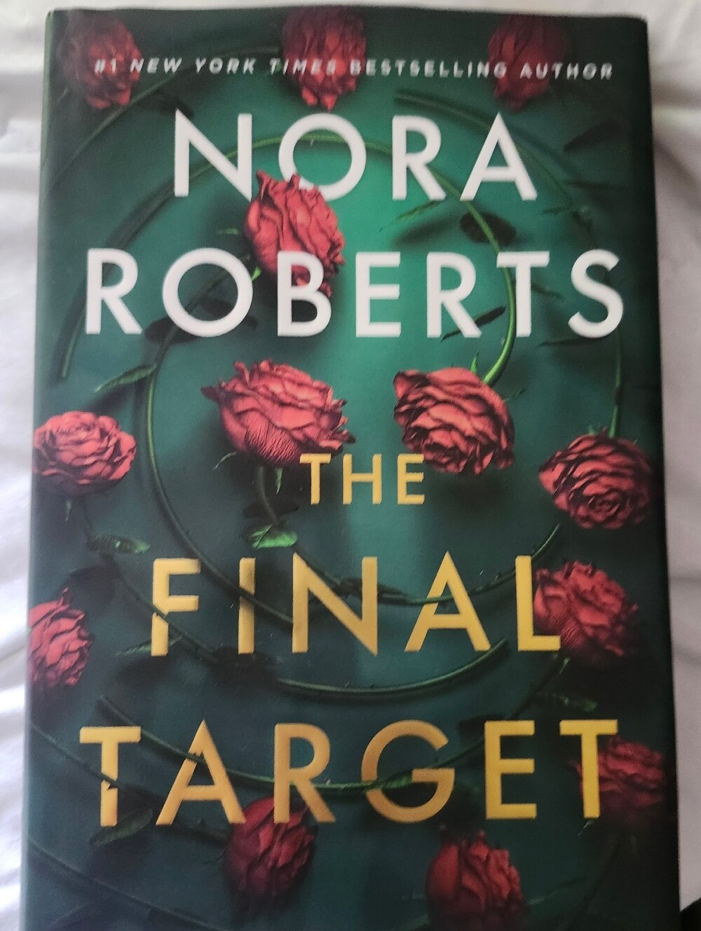The Final Target – Hardcover Novel (Green Cover with Red Roses)